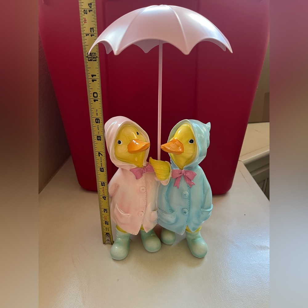 Adorable Easter Duck Figurines with Raincoats and Umbrella